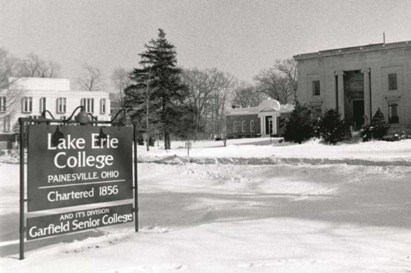 Photograph of a sign that featured Garfield Senior College on it. 