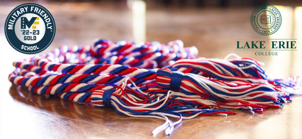 Photograph of the cords that are given to VETS students upon graduation, with the Military Friendly logo that's used to designate gold status schools. 