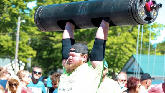 Photograph of LEC student Nathaniel Esker participating in a weight lifting contest. 