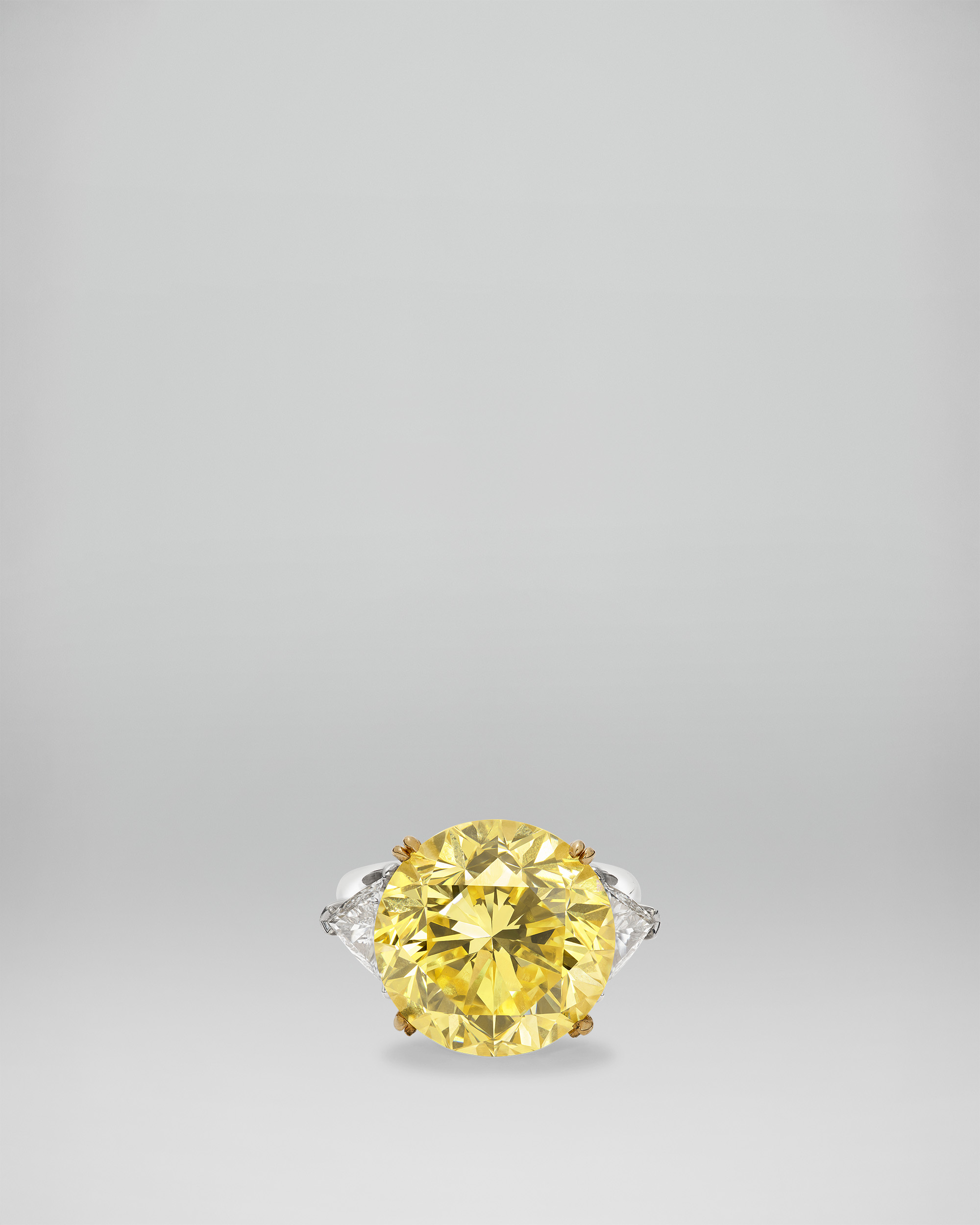 Fancy Vivid Yellow Round Brilliant Cut Diamond and White Diamond 