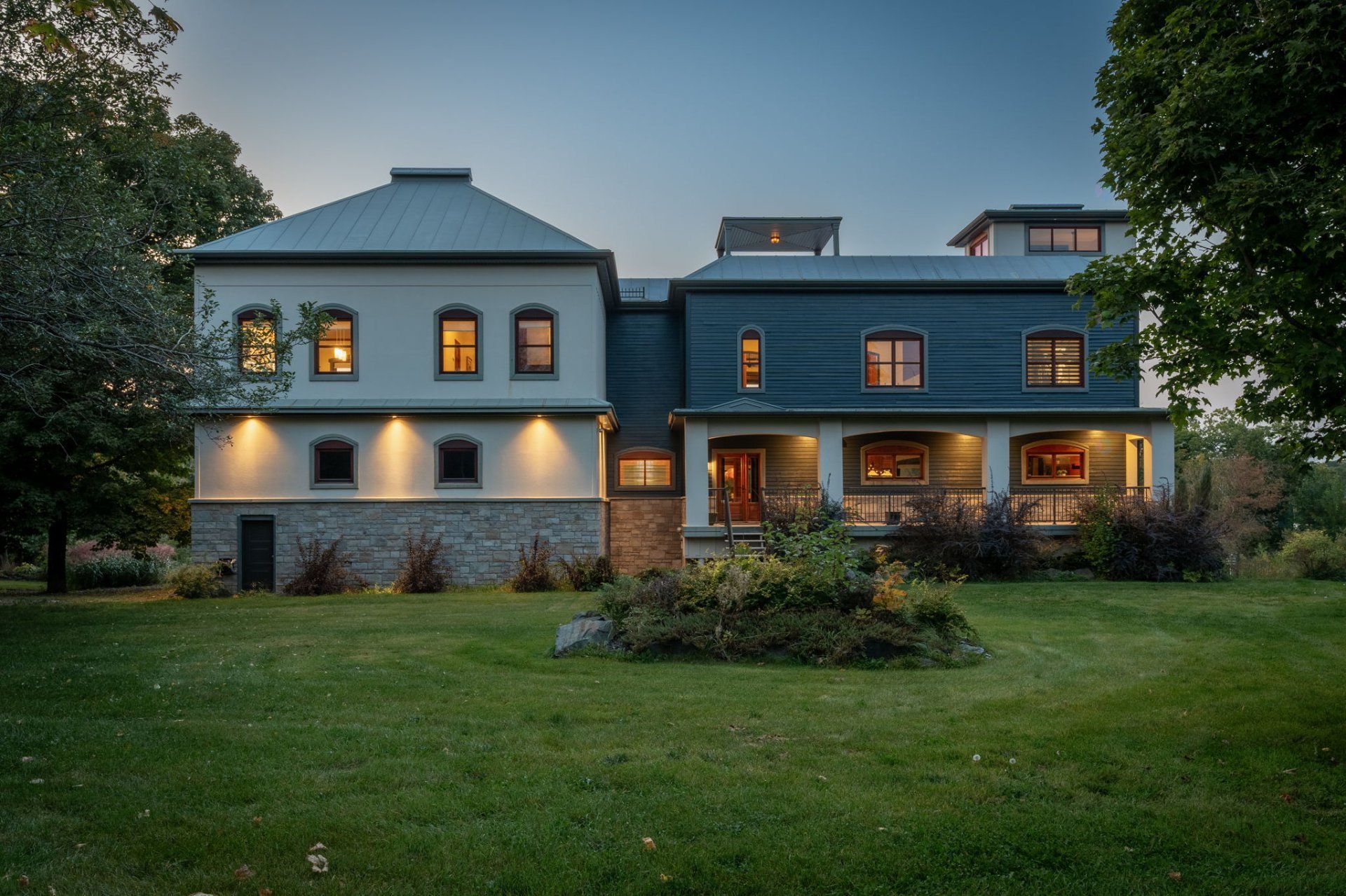 exterior of blue house at 444 Ch. des Sternes