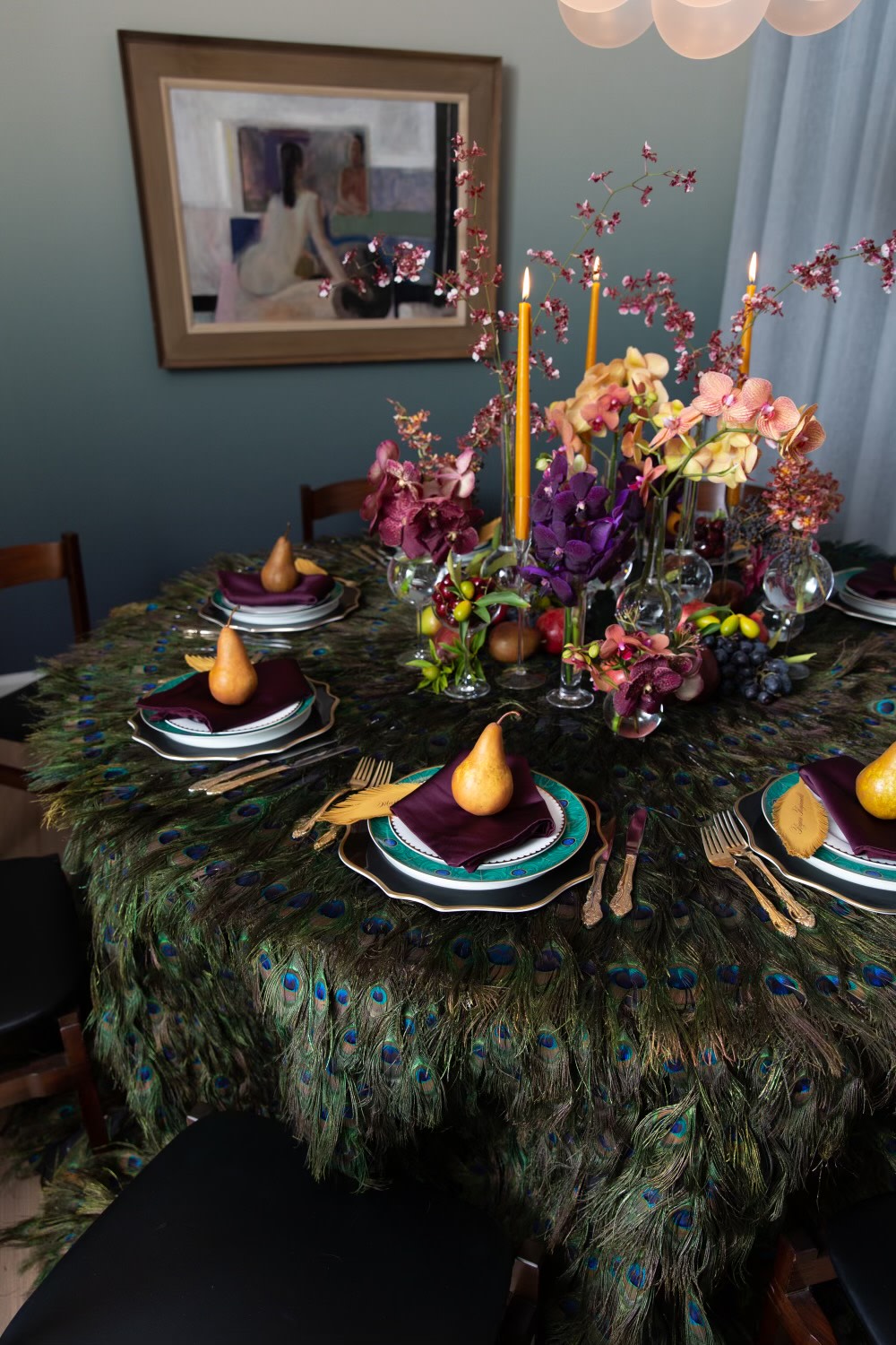 Colorful spread with peacock print table cloth