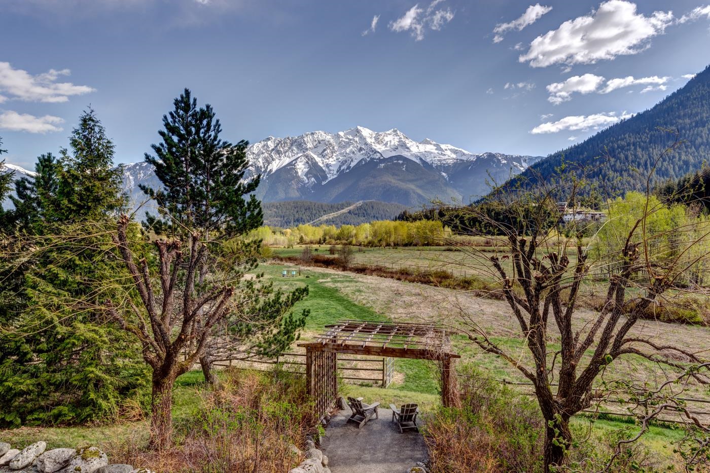 Ranch and mountain views.