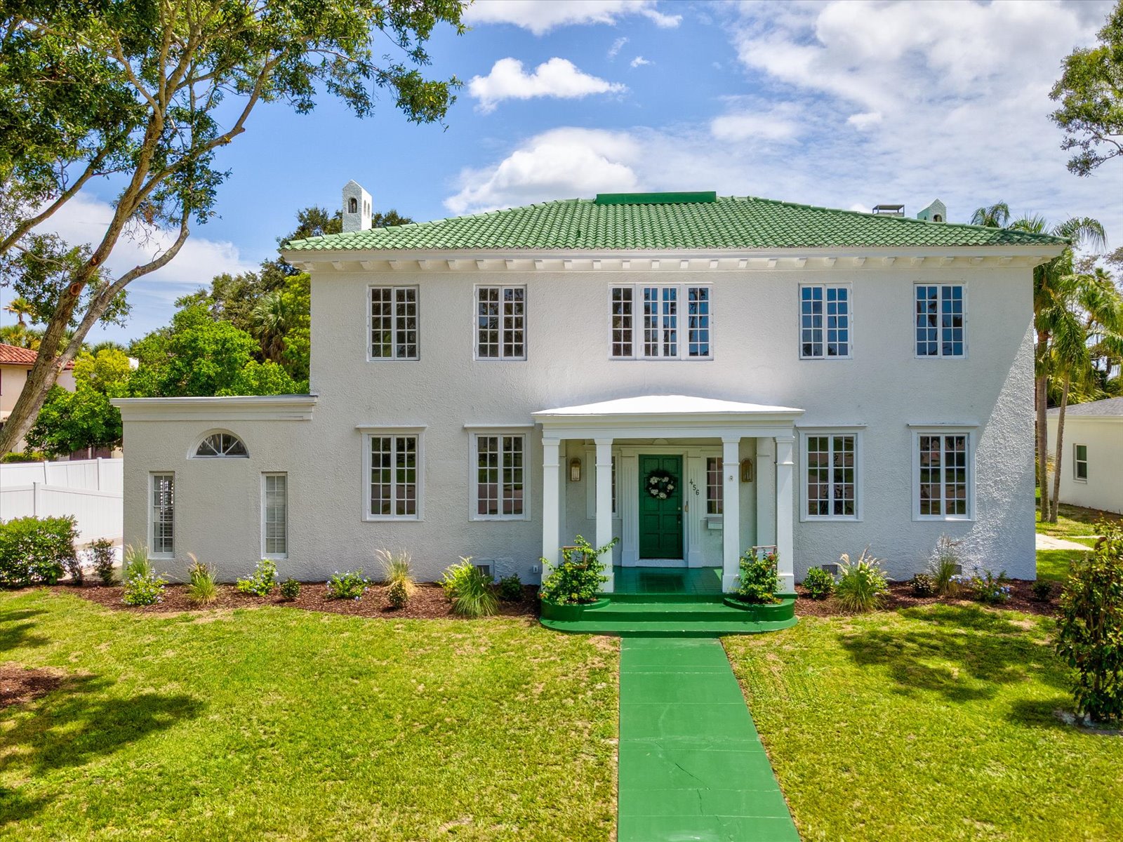 Exterior of white home at 456 Gardenia Street | Belleair, Florida