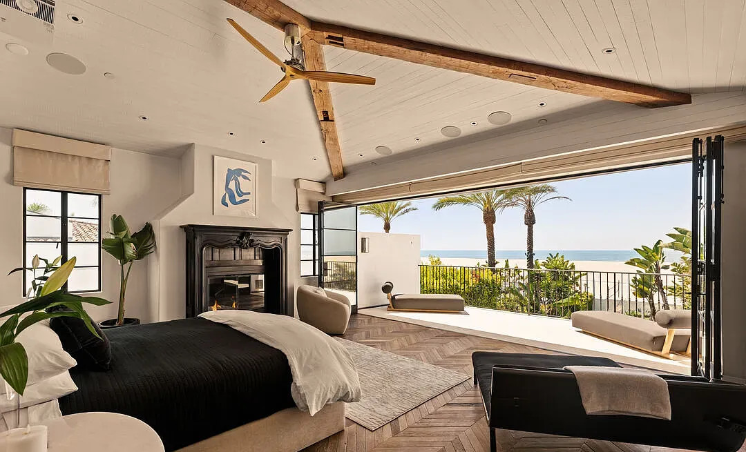 Open luxury bedroom at 966 Palisades Beach Road, Santa Monica, CA
