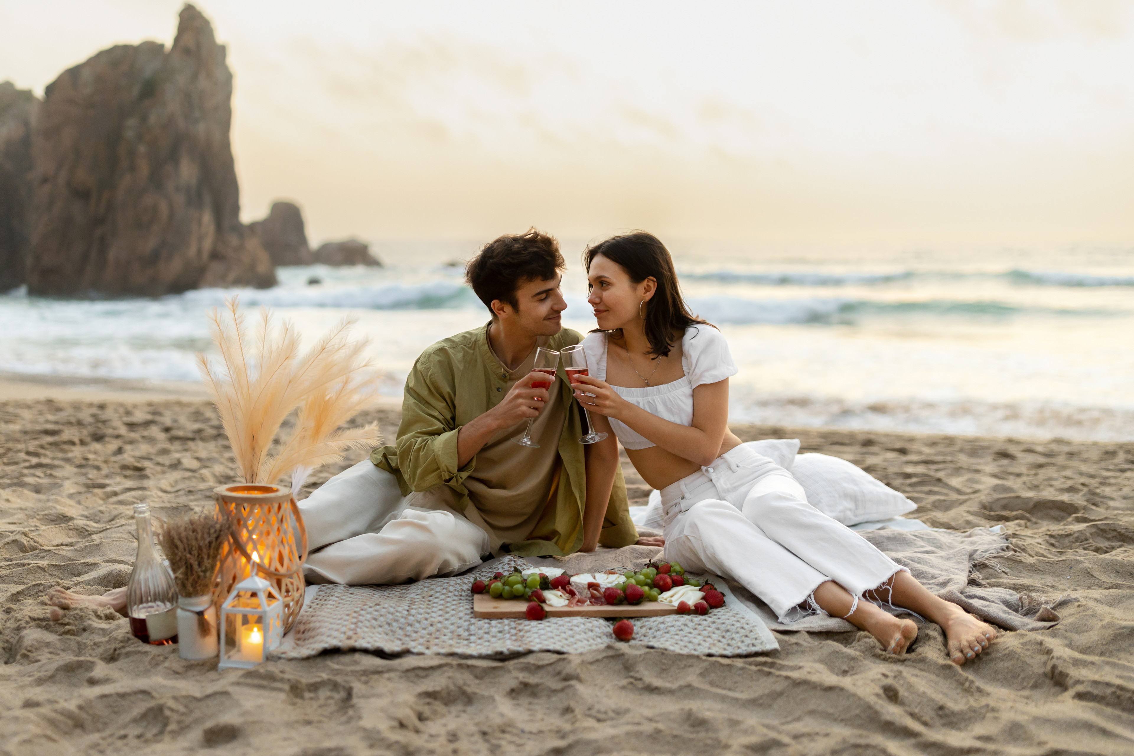 Couple having a picnic on the beach 