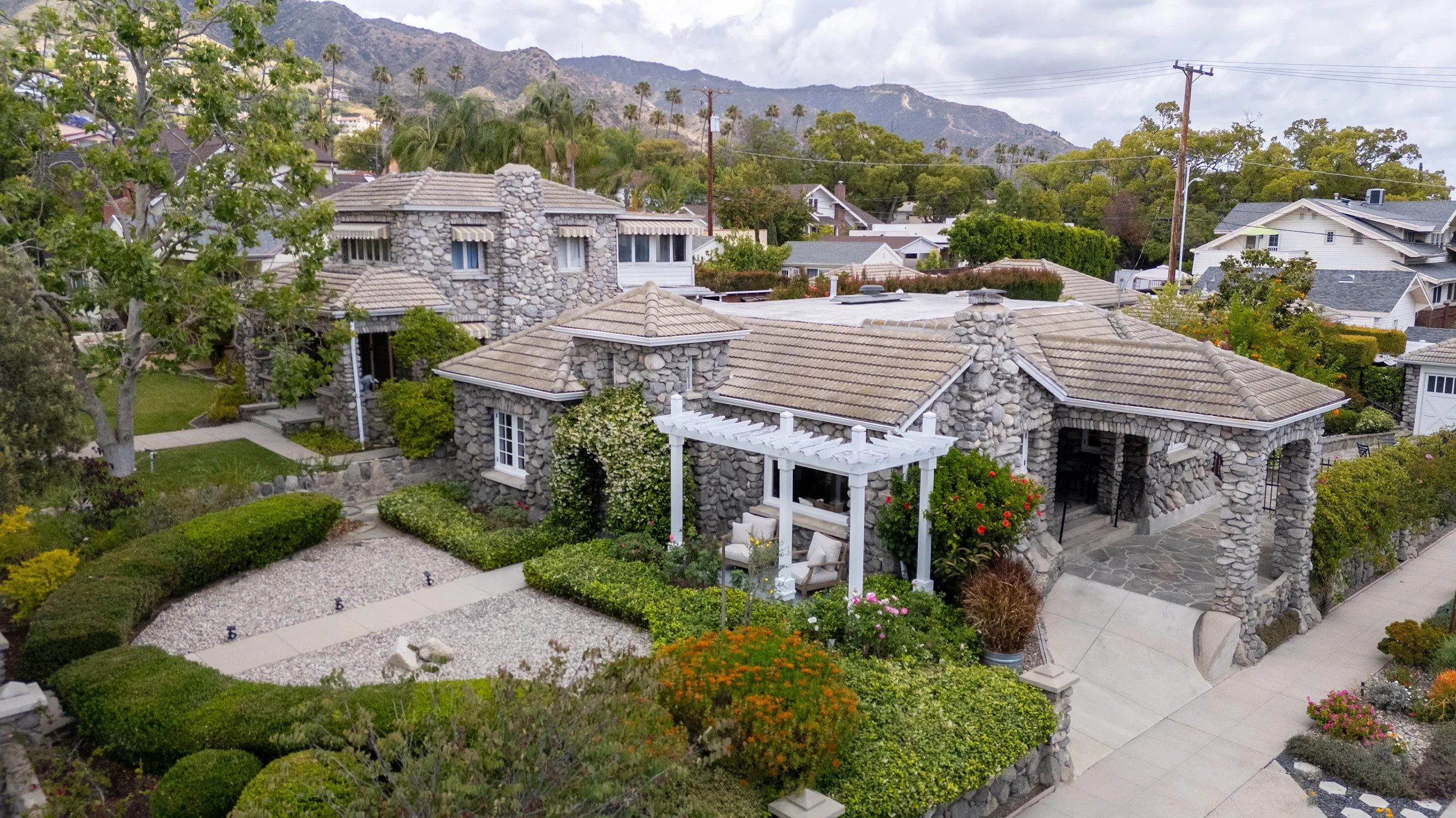 STone exterior of home at 902 E Olive Avenue