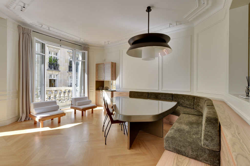 White crown moulding with large french doors and balcony.