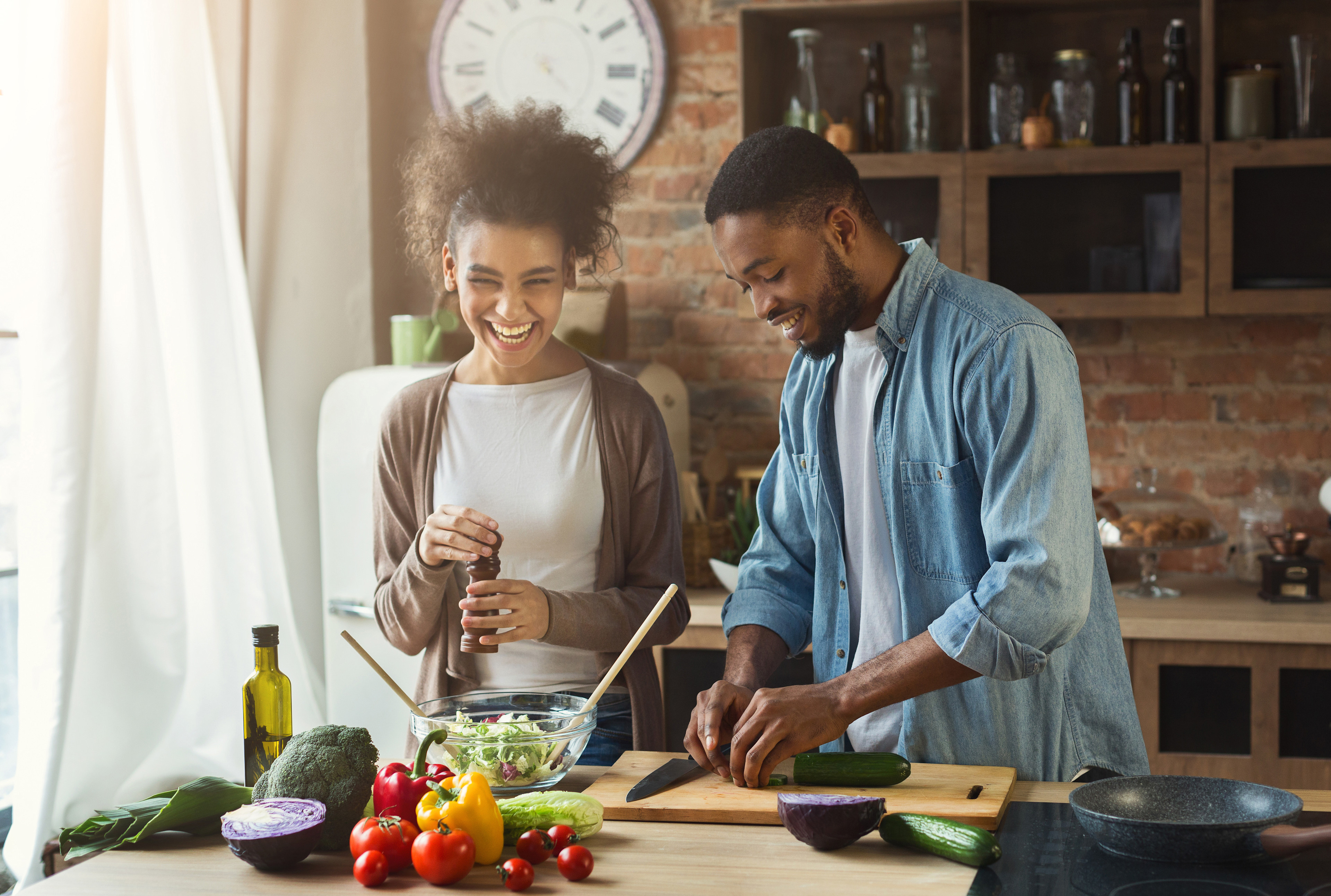 Couple cooking dinner together 