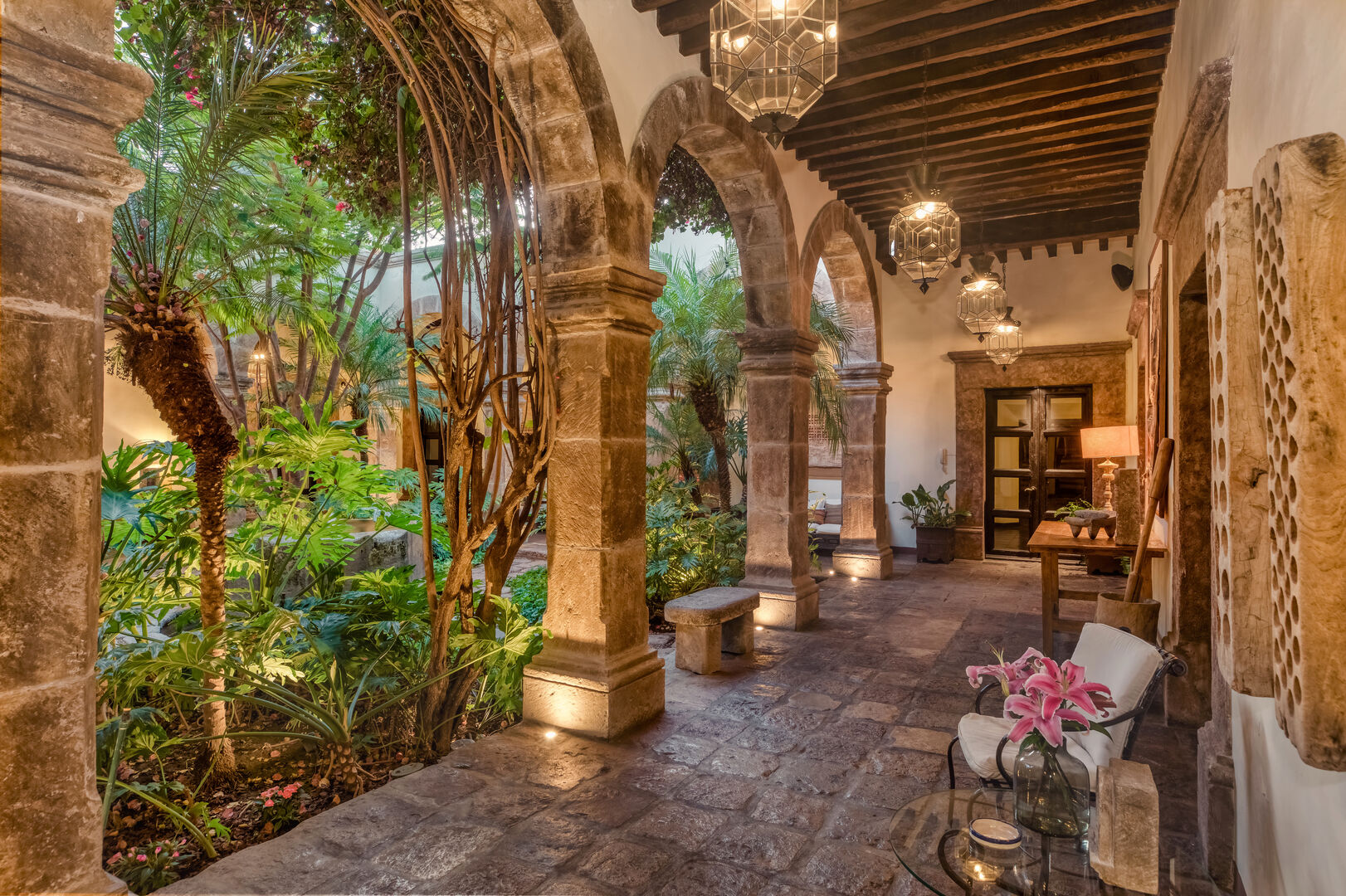 Luxury property with grand stone arches.