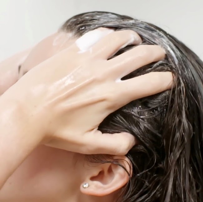 Hair care apply conditioner