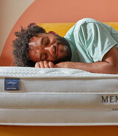 Man on memory foam mattress