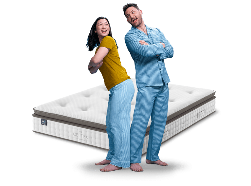 couple in yellow and blue pyjamas with mattress 