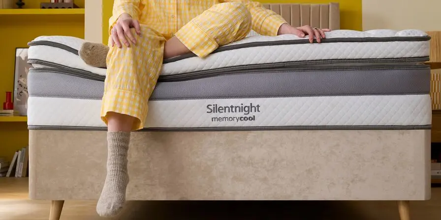 sitting on memory cool mattress