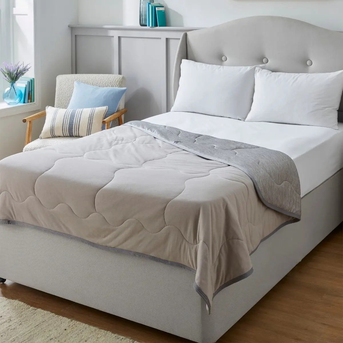 Silentnight restore cooling throw in a well lit neutral bedroom.