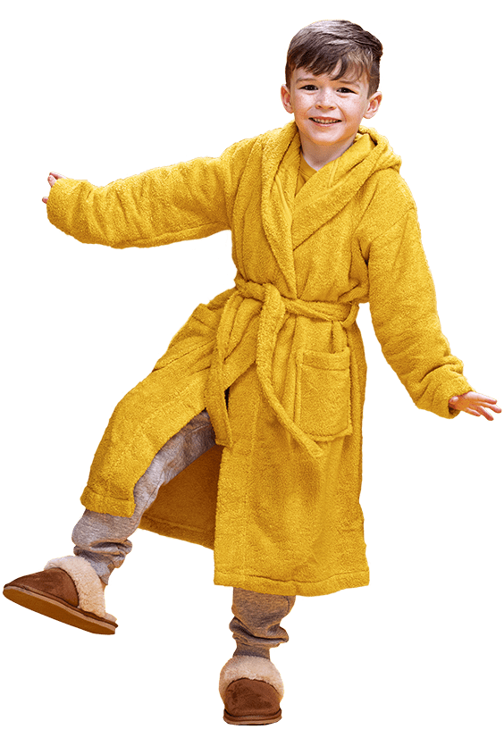 A child in a yellow dressing gown and red slippers
