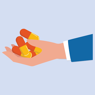 a hand holding pills and drugs with bg