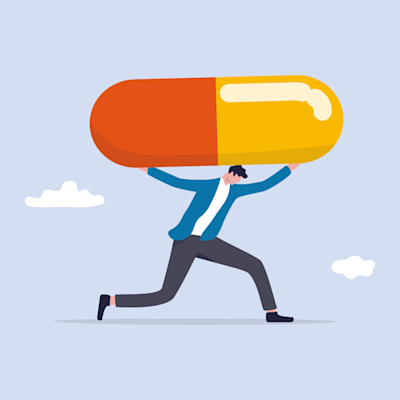 man carrying a pill with background