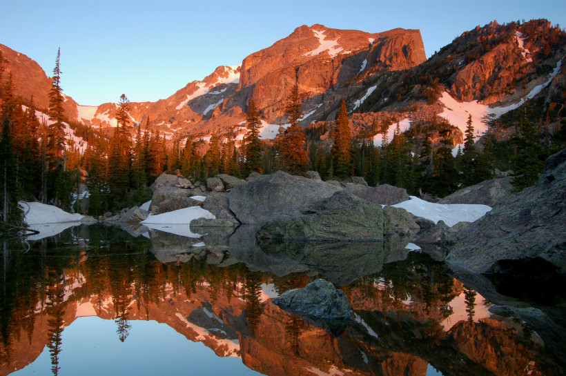 Hallet's Peak reflected in Lake Haiyaha at dawn in Rocky Mountain National Park