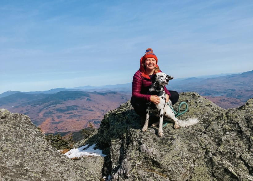 Author Kirsten hiking with her dog, Theo!