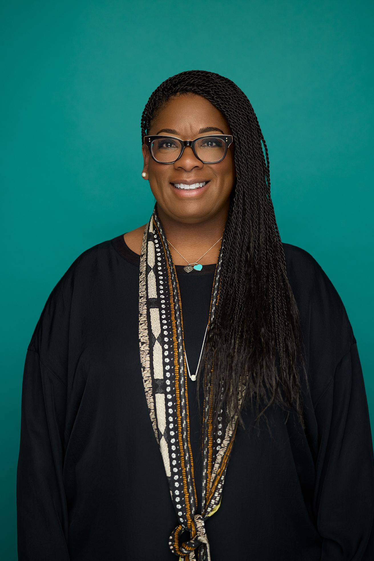 A photo of Trevite Willis against a teal background.