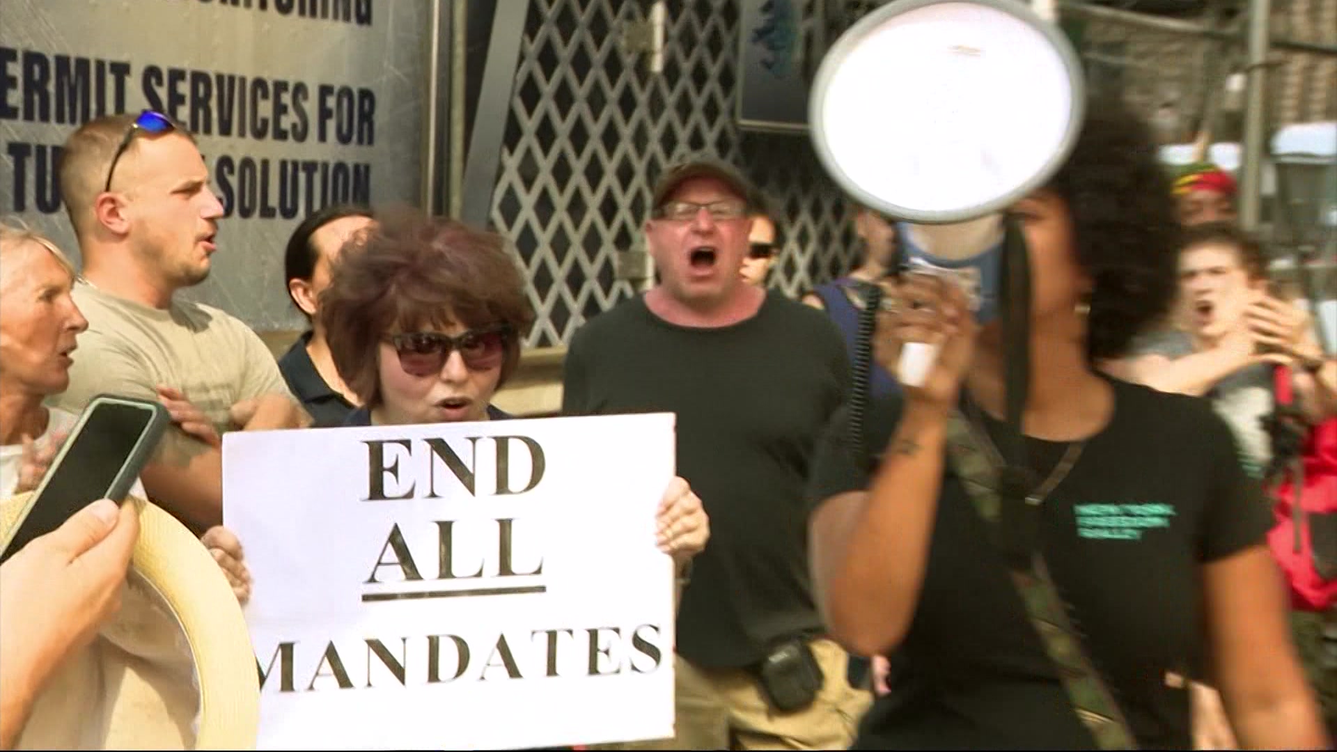 Protesters rally on 1year anniversary of teacher vaccine mandate rally