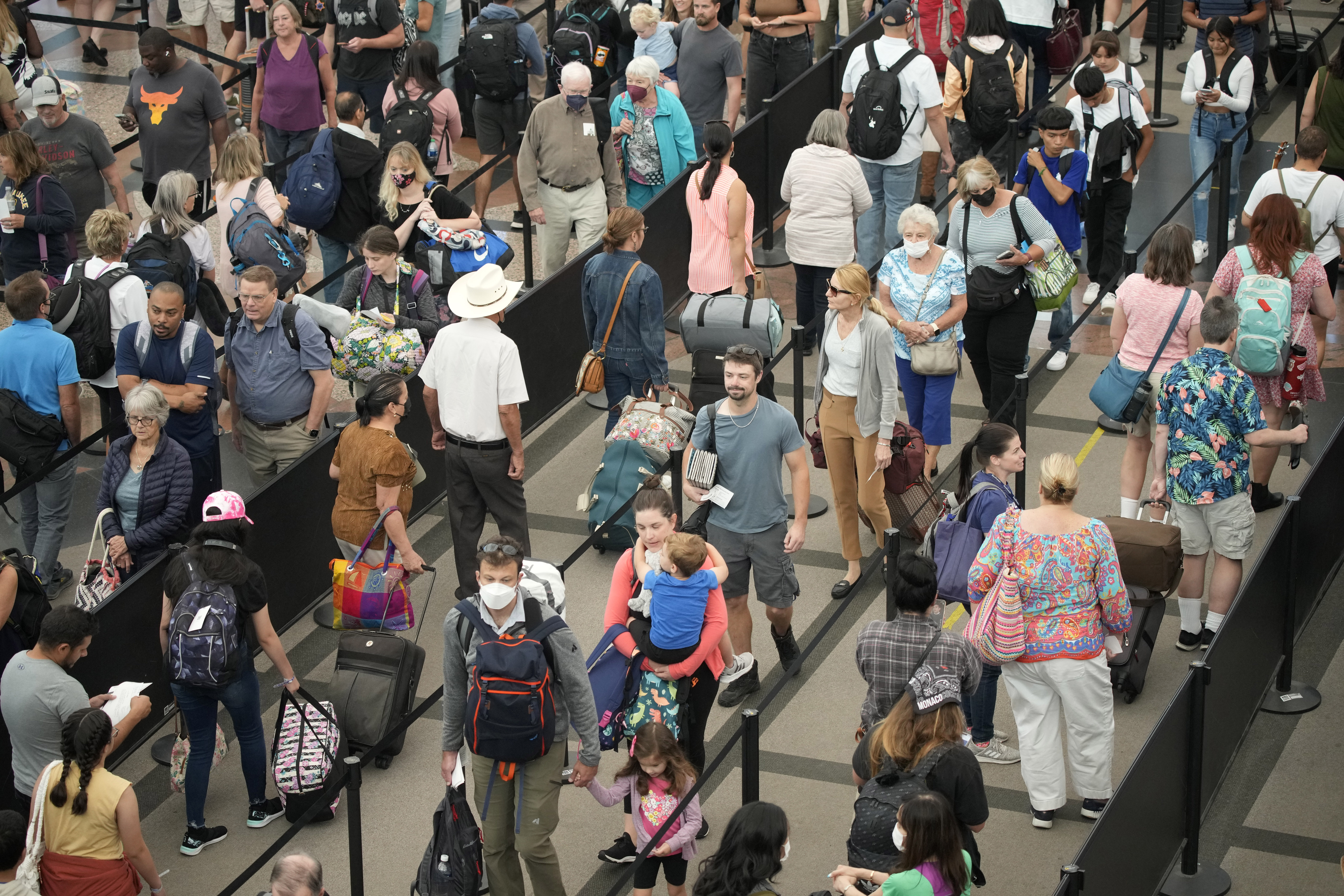 Travelers on line at airport
