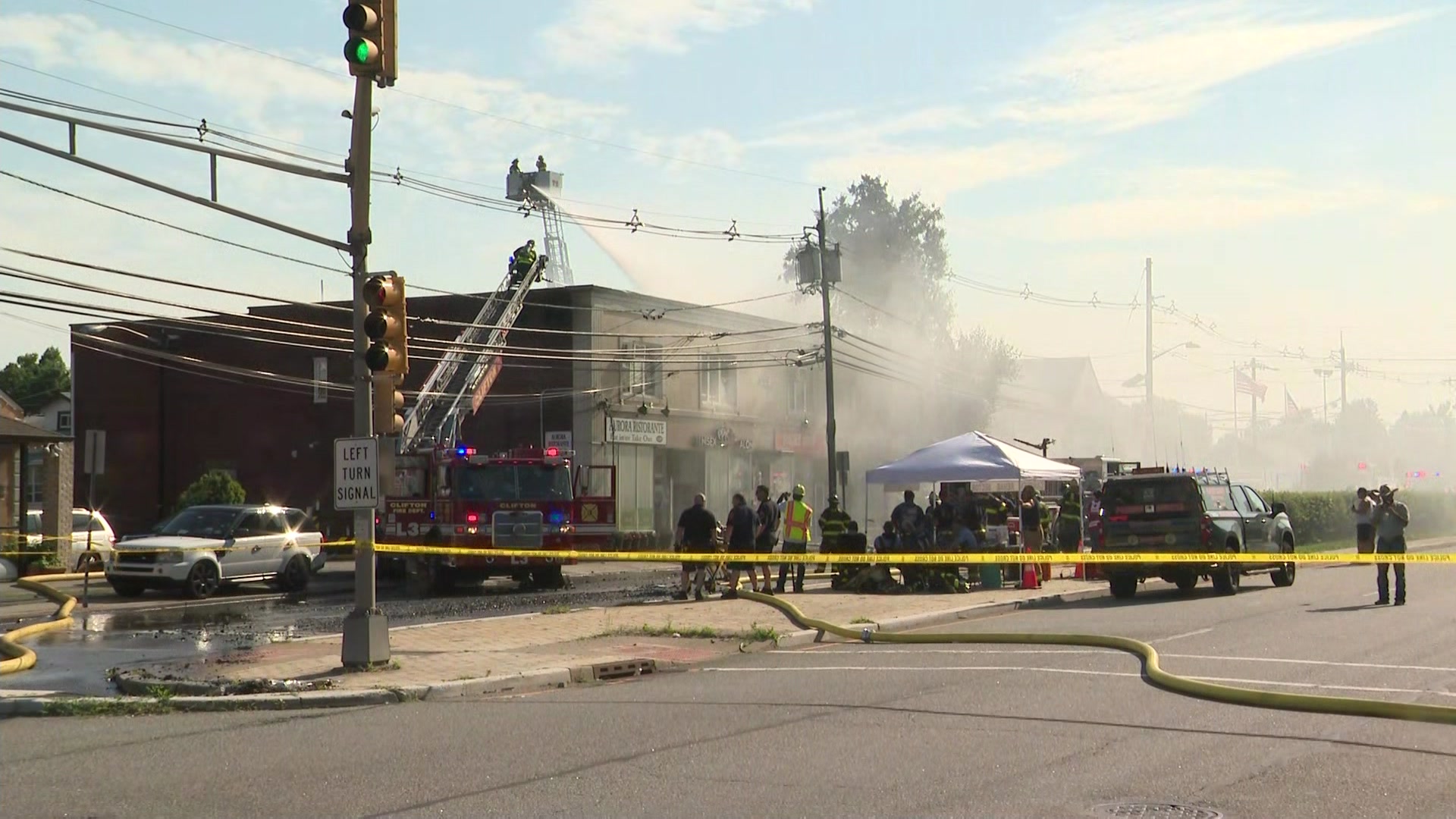 Officials Large fire destroys strip mall in Clifton