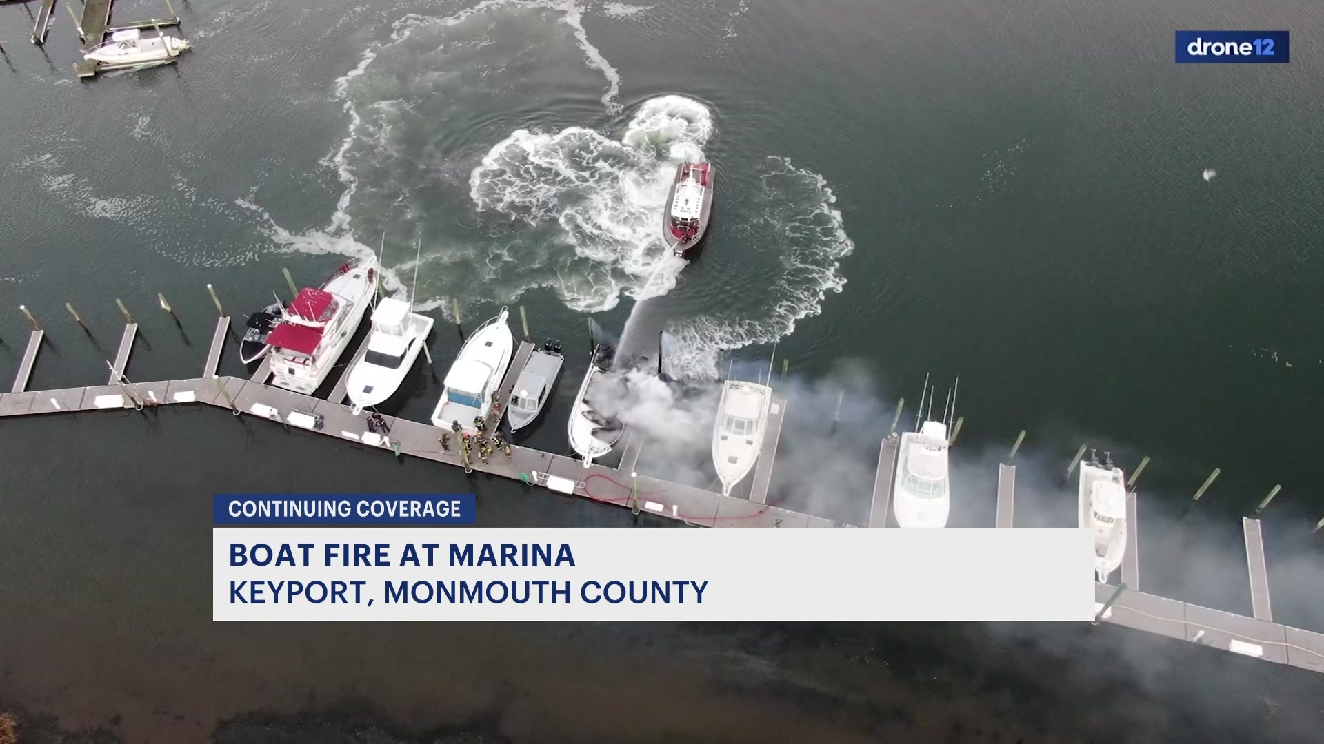 Fire at Keyport marina destroys one boat, contained by crews