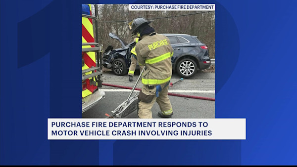 Authorities extract person from car after crash causes multiple injuries in purchase