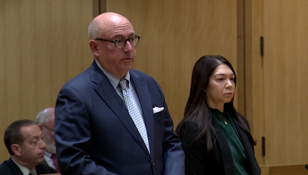 Attorney: Ex-Norwalk math coach accused of putting students in
