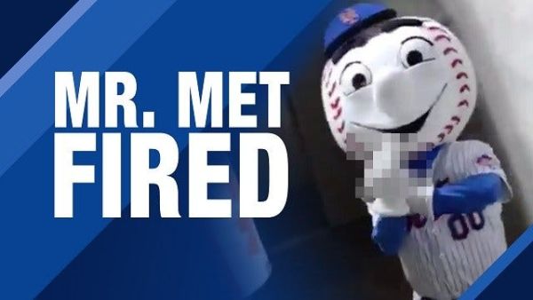 A New York Mets fan gives the thumbs-up as Met and New York