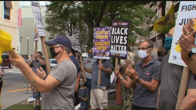 32BJ union members rally for HEROES Act outside Trump Tower