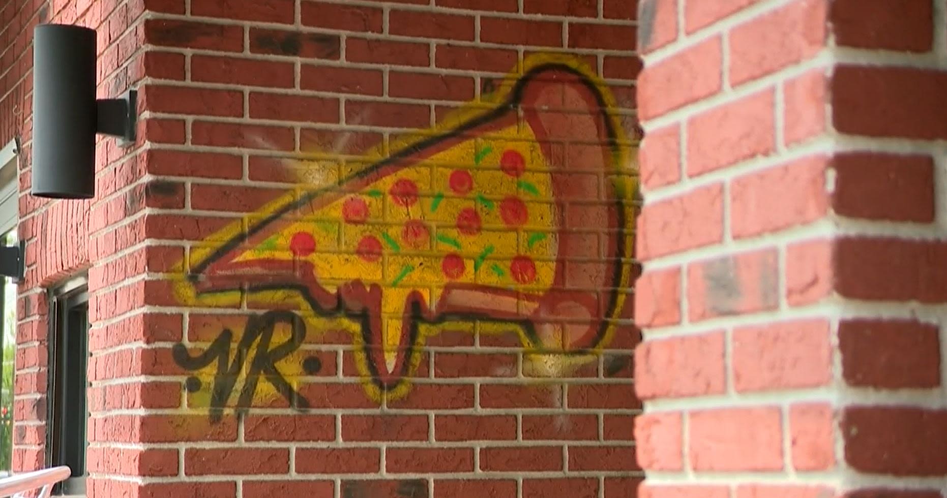 Pizza graffiti artist spraypaints 6 Westchester pizzerias