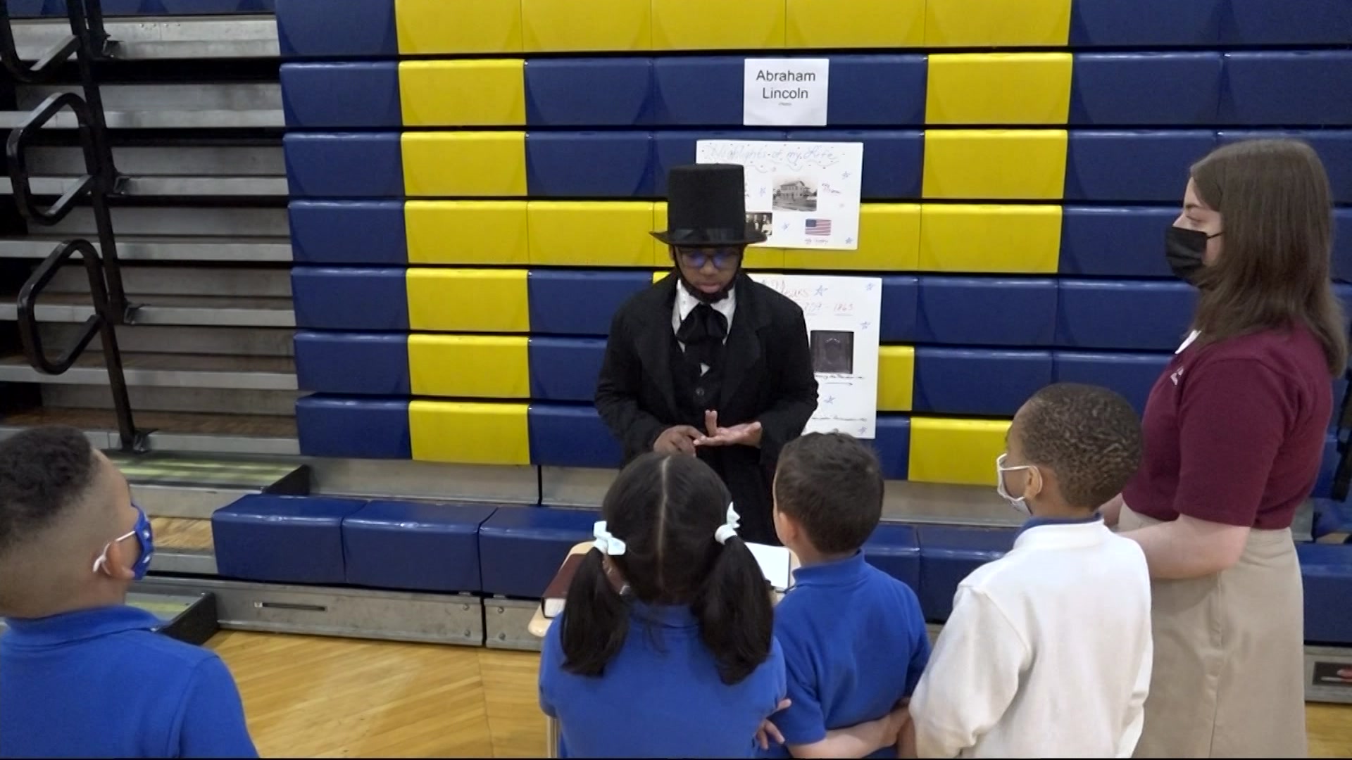 Honors students at St. Raymond’s Elementary School create living wax museum