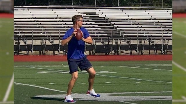 Westhampton High football players run routes for area resident Eli Manning  - Newsday