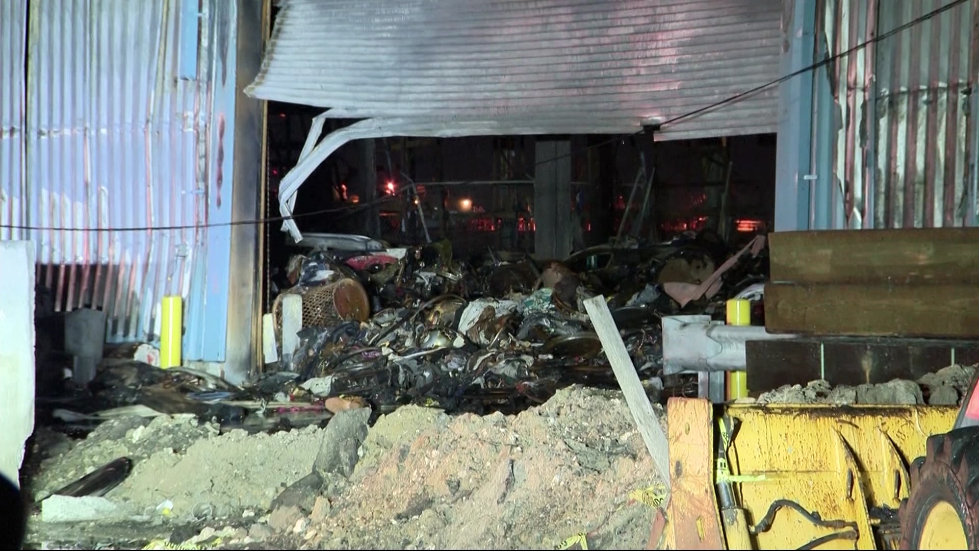 FDNY Large fire at NYPD auto pound in Red Hook persists; 8 injured