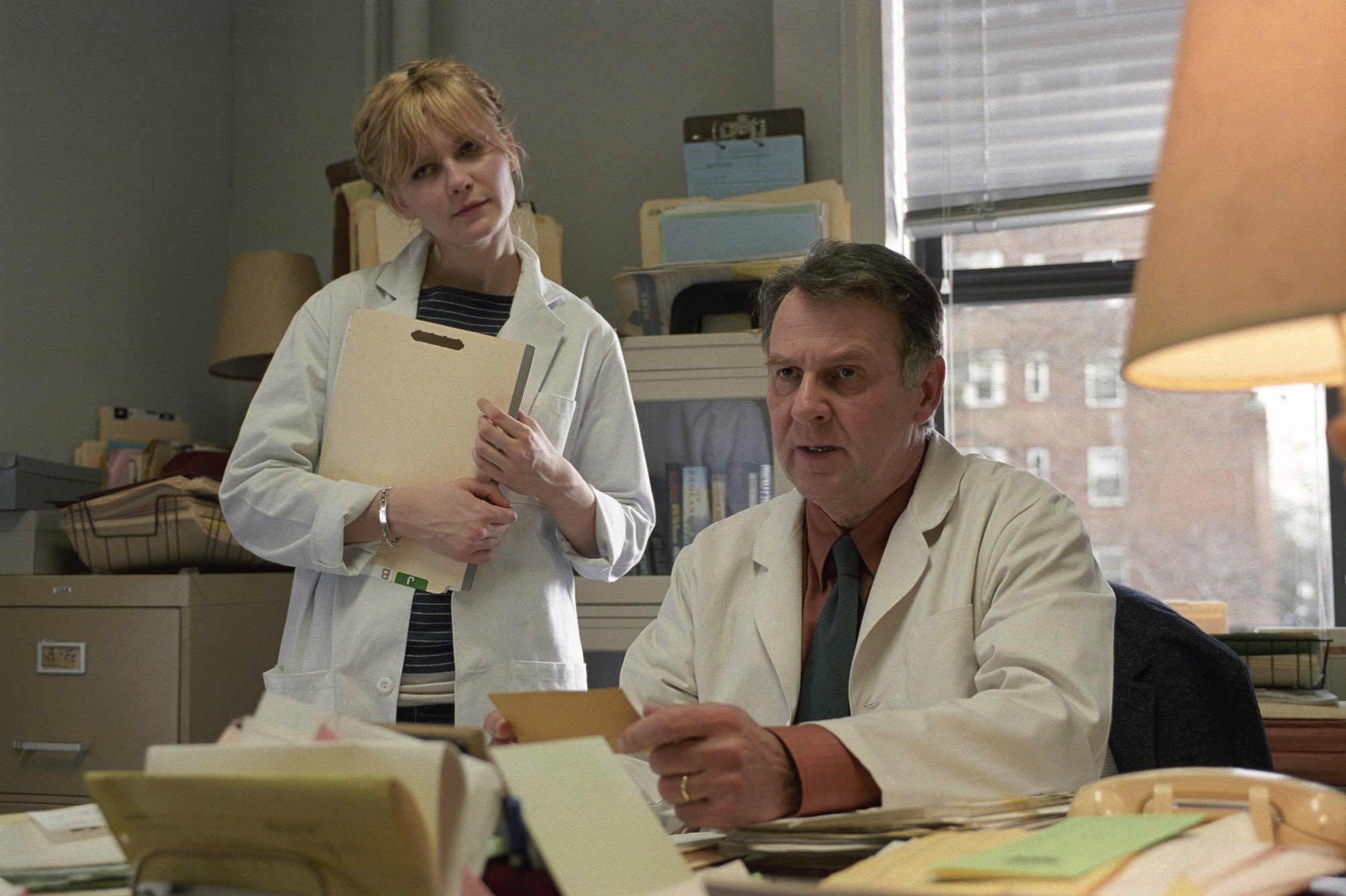 Kirsten Dunst as Mary Svevo and Tom Wilkinson Dr. Howard Mierzwiak