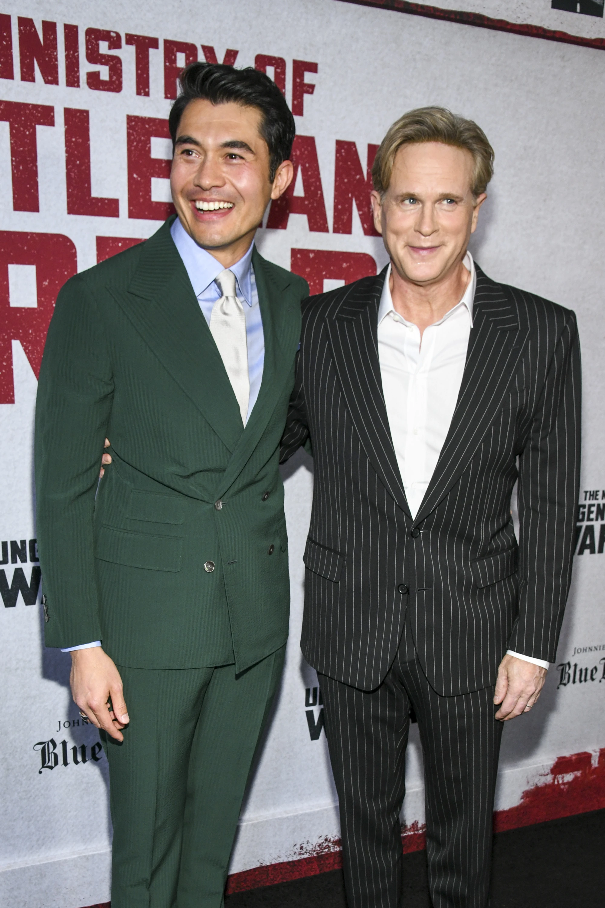 Henry Golding and Cary Elwes