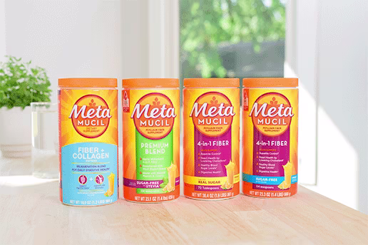 Packages of Metamucil Fiber+collagen, Premium blend, 4-in-1 fiber with real sugar and 4-in-1 fiber sugar free powders and a glass of water.