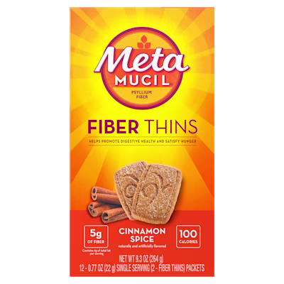 A package of Metamucil cinnamon spice fiber thins on white background.