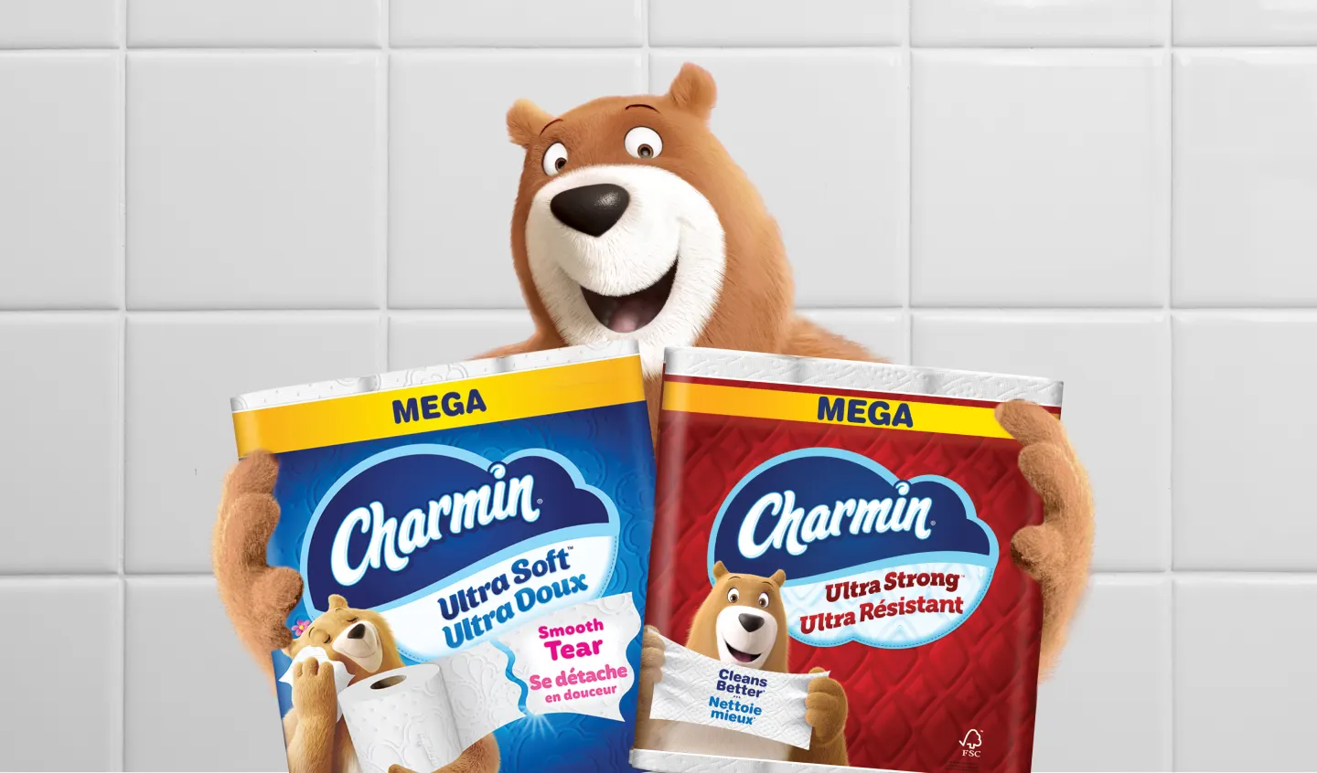 L'ours Léonard tient des emballages Méga Ultra Strong et Ultra Soft.