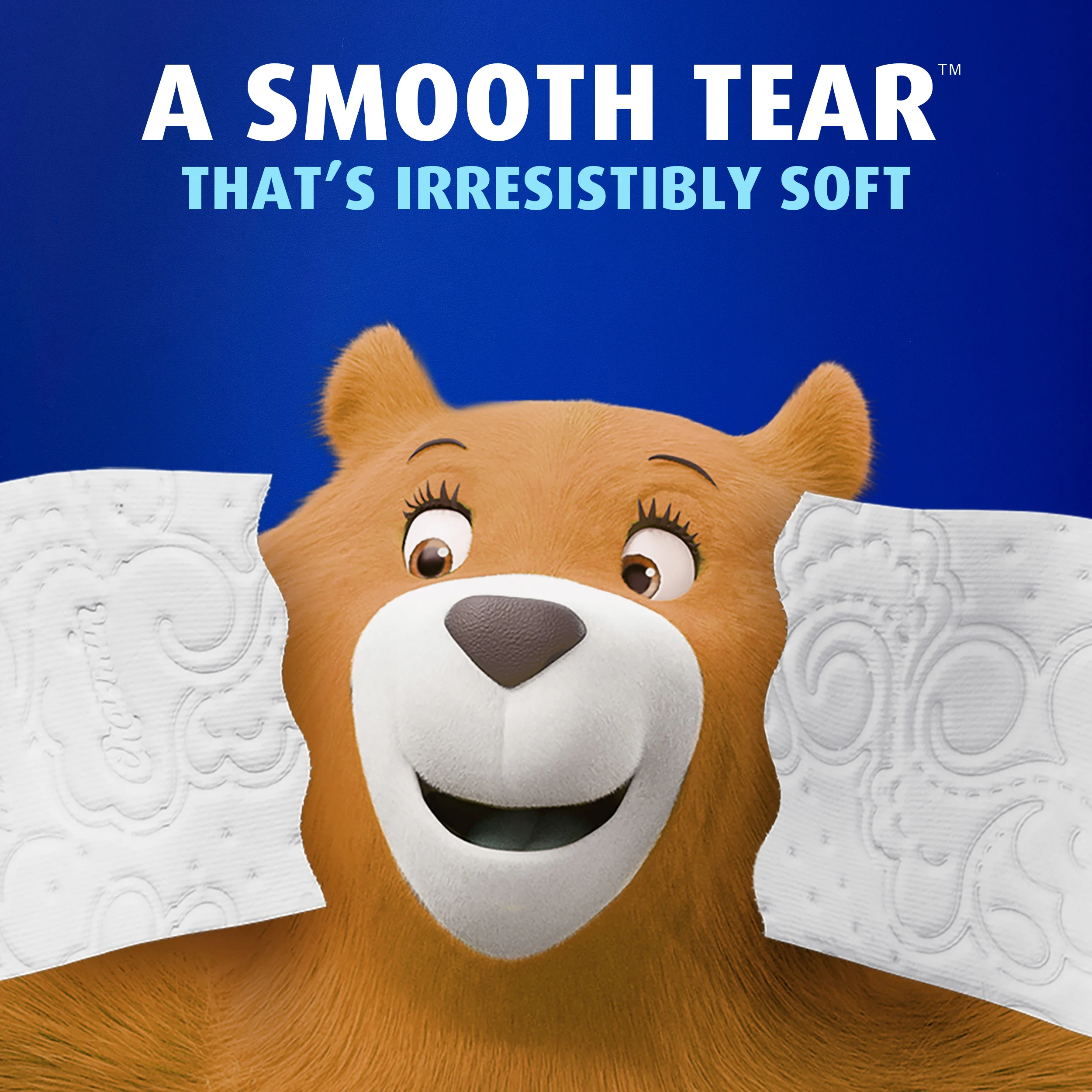 Close-up of Molly bear tearing Ultra Soft Smooth Tear showing the wavy perforation