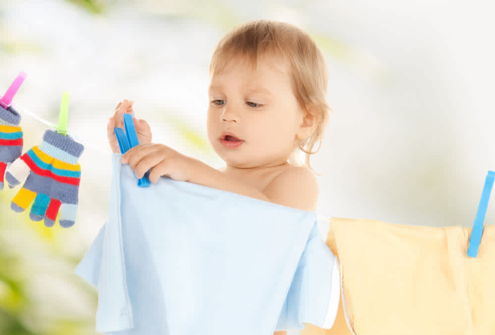 Toddler Hanging Laundry