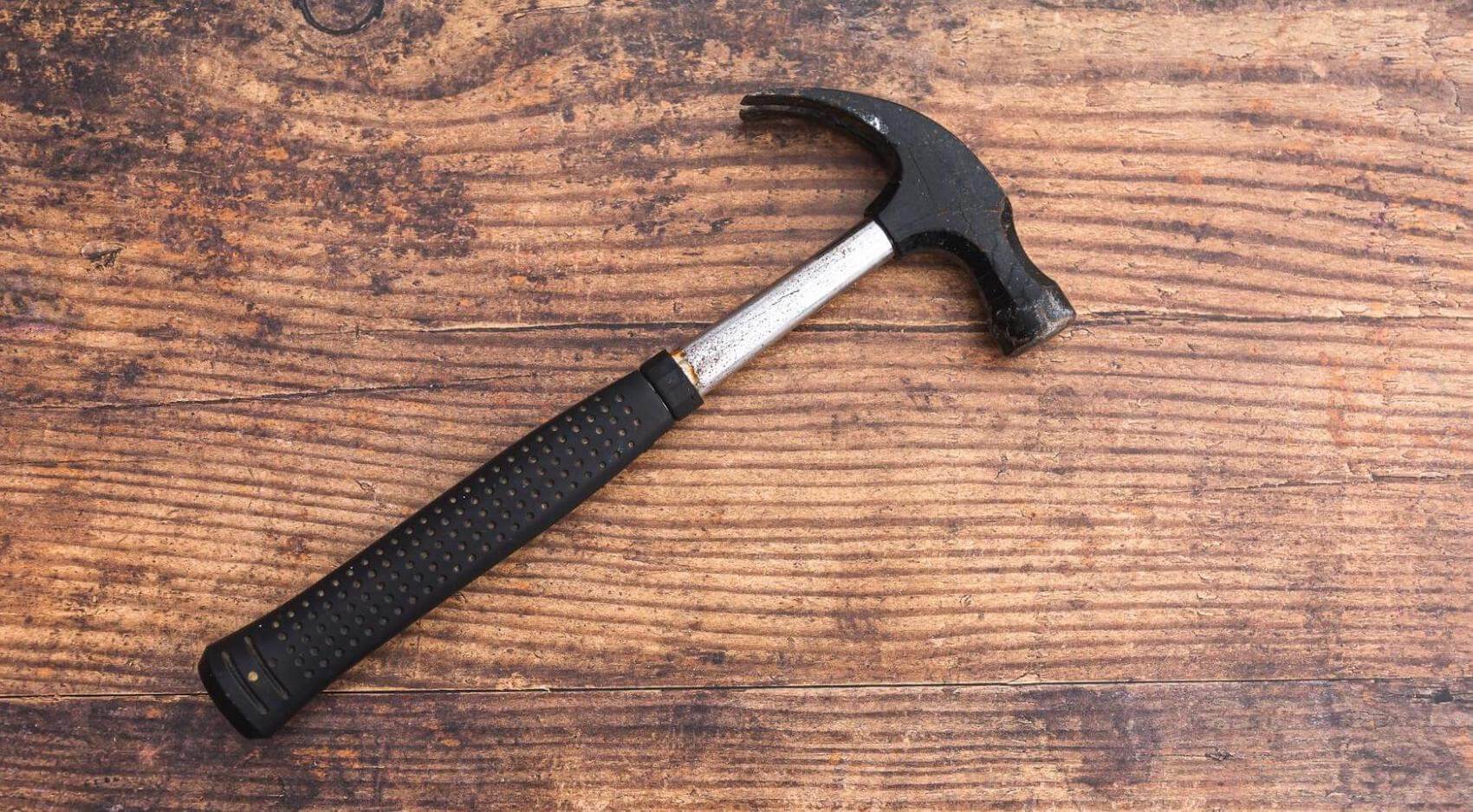 A photo of a hammer on a table