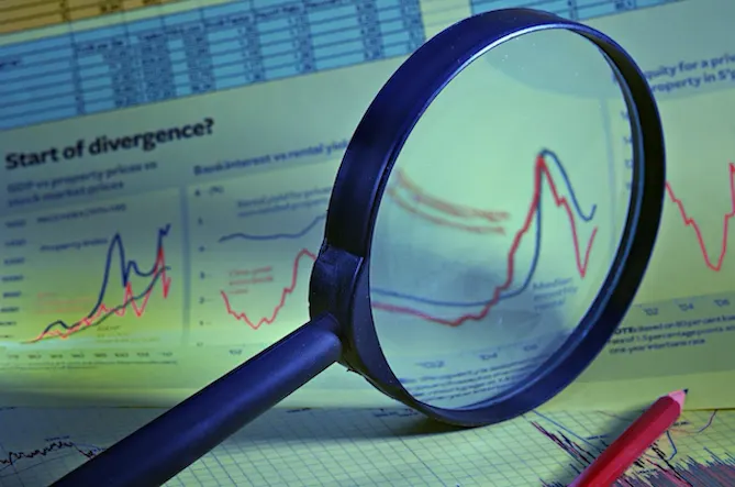 A magnifying glass over statistical data.