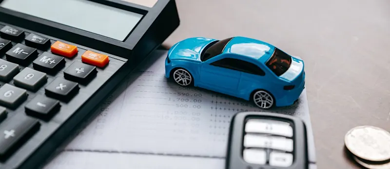 A toy car and calculator.