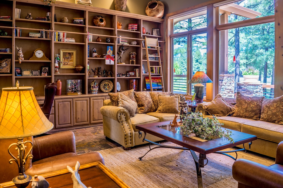 High-value living room and bookshelf contents illustrating the replacement value needed for NZ contents insurance, and featured in a Quashed contents guide.