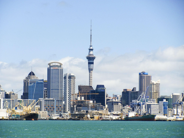 The Auckland city skyline and Sky Tower, representing the competitive New Zealand insurance landscape that Quashed helps Kiwis navigate when comparing AA Insurance in 2026.