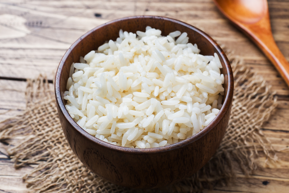 Cooked basmati rice in wooden bowl